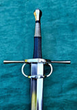 European hand and a half longsword with Gothic style details on a green background.