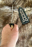 Hand carved deer antler Sgian Dubh display ready gift box held in hand with decorative sheath.