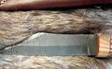 Norse Viking Utility Scramasax Damascus Blade with detailed blade design and olive wood handle on fur background