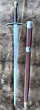 Wakefield knightly bastard sword with a polished blade and wooden sheath.