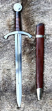 The Bedford Medieval Sword Hilted Dagger alongside its leather sheath displayed on fur.