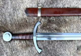 The Bedford Medieval Sword Hilted Dagger displayed beside its scabbard on a fluffy background.