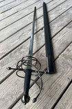 Ambidextrous Renaissance Rapier with scabbard displayed on wooden surface, showcasing 17th-century craftsmanship.