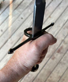 Main Gauche Parrying Dagger held in hand, showcasing its blade and hilt design.