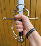 Sidesword With Complex Hilt held in hand showcasing intricate hilt design and leather grip.