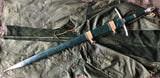 LOTR Strider Ranger sword replica by Kingdom Of Arms displayed on green fabric.