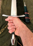 Person holding the LOTR Strider Ranger dagger by Kingdom Of Arms with a sturdy grip.