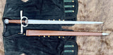 Renaissance Battle Sword by KoA displayed on a black vest, highlighting its blade and sheath.