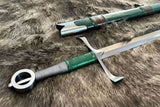 Irish hand and a half sword by Kingdom Of Arms with green handle displayed on fur background.