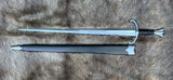 The Giornico Arming Sword with upgraded scabbard and detailed craftsmanship on a fur background.