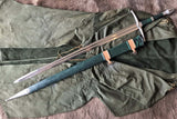 Image of LOTR Strider Ranger sword replica by Kingdom of Arms, featuring a hand-forged blade on green fabric.